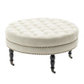Round Tufted Fabric Cocktail Ottoman with Rubberwood Legs & Wheels