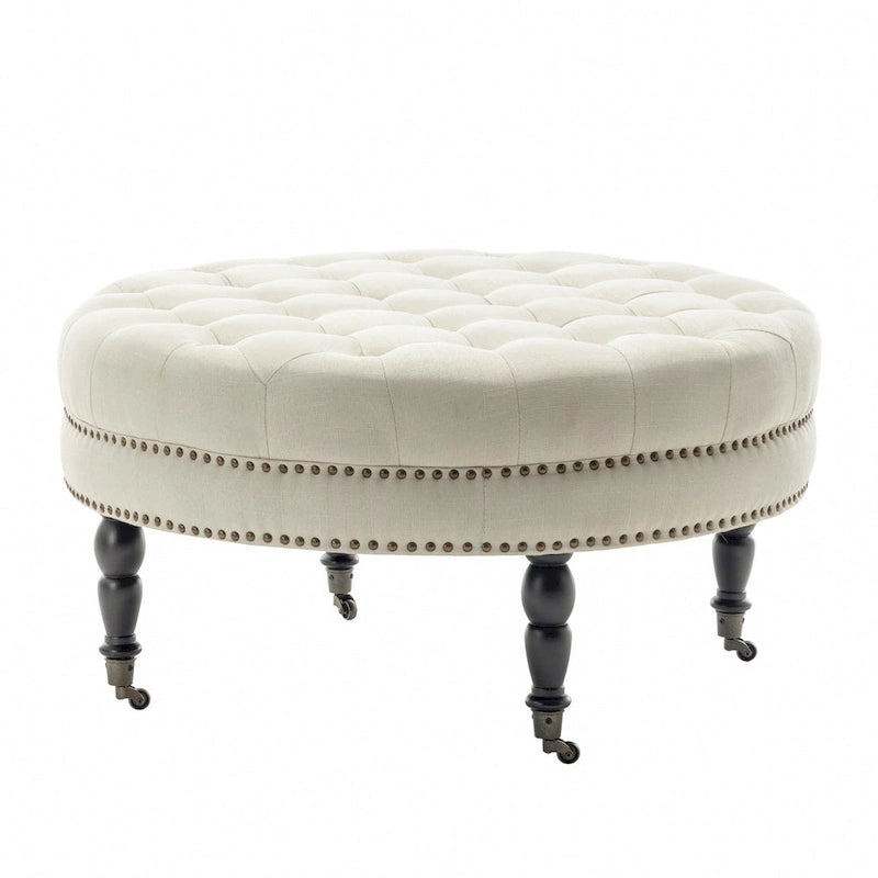 Round Tufted Fabric Cocktail Ottoman with Rubberwood Legs & Wheels