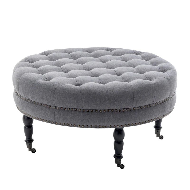 Round Tufted Fabric Cocktail Ottoman with Rubberwood Legs & Wheels