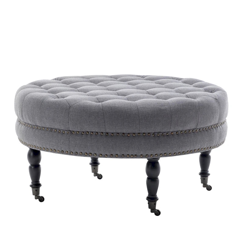 Round Tufted Fabric Cocktail Ottoman with Rubberwood Legs & Wheels